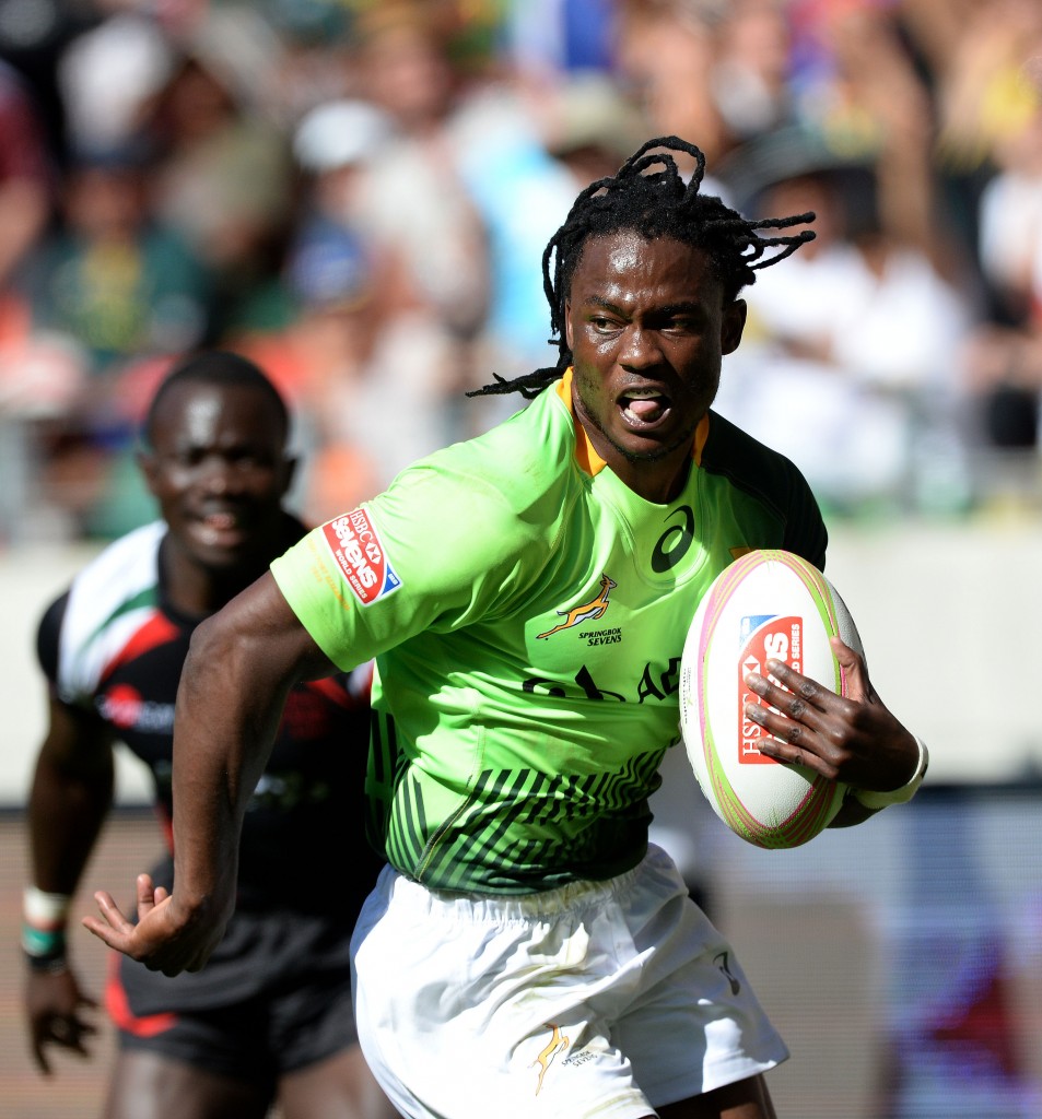 PORT ELIZABETH, SOUTH AFRICA - DECEMBER 13: Seabelo Senatla of South Africa runs in for his second try during day 1 of the Cell C Nelson Mandela Bay Sevens Series at Nelson Mandela Bay Stadium on December 13, 2014 in Port Elizabeth, South Africa. (Photo by Duif du Toit/Gallo images)